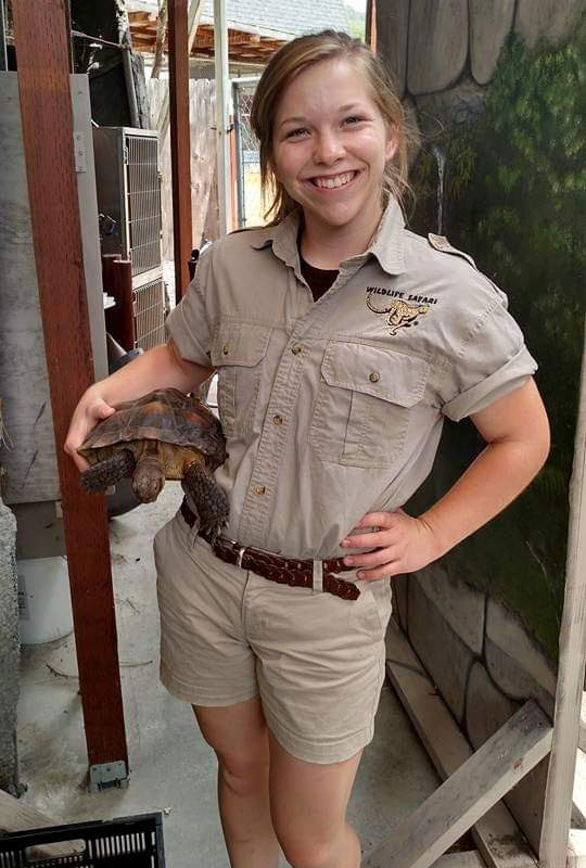 Bridget Burns with a turtle
